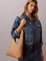 CALVIN KLEIN Logo Strap Shoulder Bag IN SAND