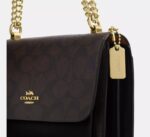 COACH Mini Klare Crossbody Bag In Signature Canvas bROWN BLACK