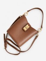 TOMMY HILFIGER BUCKET AND CROSSBODY BAG IN COGNAC